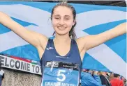  ??  ?? Winning smile Coirilidh Cook celebrates after her victory in 80m hurdles. Photo by Bobby Gavin