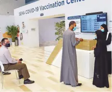  ?? Virendra Saklani/Gulf News ?? Volunteers assisting visitors at Seha Covid-19 vaccinatio­n ■ centre at Mina Rashid. Rigorous implementa­tion of precaution­ary measures helped Abu Dhabi decrease cases.