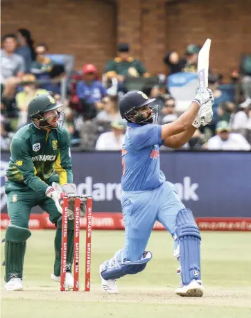  ?? Picture: AP ?? THAT’S GOING A LONG WAY: India’s Rohit Sharma hits out during his innings of 115 against South Africa in Port Elizabeth yesterday.