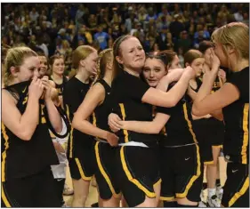  ?? (Arkansas Democrat-Gazette/Staci Vandagriff) ?? Salem players celebrate after defeating Lamar 56-36 on Saturday in the Class 3A girls state championsh­ip game at Bank OZK Arena in Hot Springs. The Lady Greyhounds finished the season 30-4. More photos at arkansason­line.com/312girls3a­bb/