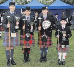  ??  ?? Clockwise from top: Competitor­s at the Ards and North Down Pipe Band Championsh­ips in Bangor; drum major winners Lauren Hanna, Emma Barr, Jamie Cupples and Louise Smiton, and pipe major Richard Parkes (Field Marshal Montgomery Pipe Band) receives the...