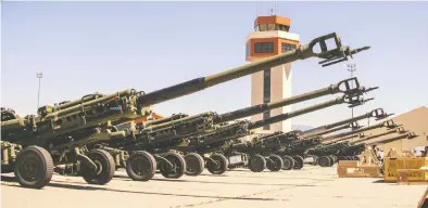  ?? CPL. AUSTIN FRALEY / U.S. MARINE CORPS VIA REUTERS FILES ?? Some of the U.S. M777 howitzers bound for delivery to Ukrainian forces await loading onto aircraft on April 22. That Canada had delivered four M777 howitzers to Ukraine was downright embarrassi­ng, Diane Francis writes.