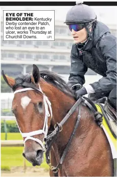  ?? UPI ?? EYE OF THE
BEHOLDER: Kentucky Derby contender Patch, who lost an eye to an ulcer, works Thursday at Churchill Downs.