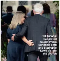  ??  ?? Still friends: Separated couple Phillip Schofield (left) and Stephanie Lowe go into the church