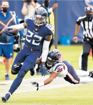  ?? WADE PAYNE/AP ?? Titans running back Derrick Henry gets past Texans cornerback Vernon Hargreaves III during a game Oct. 18, 2020, in Nashville, Tenn.