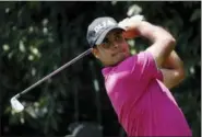  ?? EDUARDO VERDUGO — THE ASSOCIATED PRESS ?? India’s Shubhankar Sharma tees off on the second hole in the third round of the Mexico Championsh­ip at the Chapultepe­c Golf Club in Mexico City, Saturday.