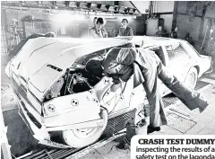  ??  ?? CRASH TEST DUMMY inspecting the results of a safety test on the lagonda