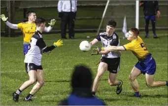  ??  ?? Sligo’s Adam Gallagher and Dáire O’Boyle, as Sligo manager Daragh Fallon watches on in Bekan. Pic: Donal Hackett.