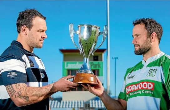  ?? RICKY WILSON/STUFF ?? Marlboroug­h division one grand final rivals, Baxter Wilson, left, captain of Moutere, and Glen Ballam, co-captain of Renwick get acquainted with the silverware on offer at Lansdowne Park on Saturday.