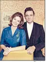 ?? File photo ?? Johnny Cash poses with his wife, June Carter Cash, in this undated photo. Archivists in Arkansas were surprised to learn that Cash’s artifacts could one day reside in Tulsa, alongside those of Woody Guthrie and Bob Dylan.