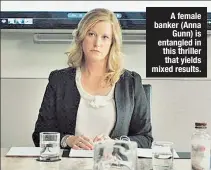  ??  ?? A female banker (Anna Gunn) is entangled in this thriller that yields mixed results.