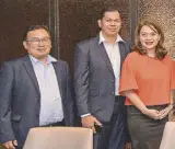  ??  ?? AXA Assistance Philippine­s CFO Jerry Almerido and CEO Ronald Carrillo with AXA Philippine­s chief customer officer Amor Balagtas.