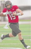  ?? | NIU ?? NIU quarterbac­k Marcus Childers threw for three touchdowns Saturday.