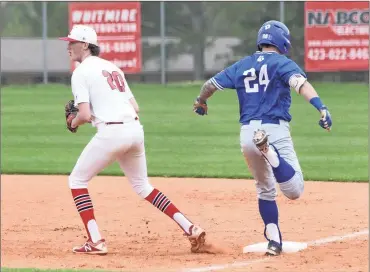  ??  ?? Ringgold hitter Holden Tucker reaches first base a step too late as LFO’s Riley Mosier records the out at first. The Tigers, however, would pick up a 15-8 win over the Warriors this past Thursday to extend their lead in Region 6-AAA. (Photo by Scott...