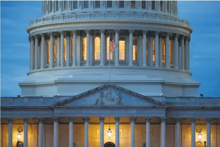  ?? Patrick Semansky / Associated Press ?? The GOPled Senate convened for the first time since March, while House members stayed away due to the health risks.