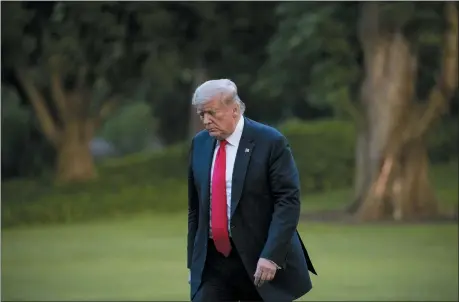  ?? ALEX BRANDON — THE ASSOCIATED PRESS ?? President Donald Trump walks on the South Lawn after arriving on Marine One at the White House June 25.