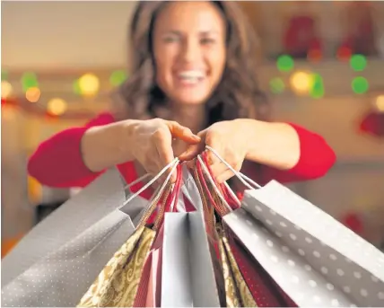  ??  ?? > People are set to spend less on Christmas this year