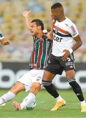  ?? DANIEL CASTELO BRANCO ?? Autor do gol do Flu, Fred é marcado pelo equatorian­o Arboleda