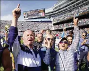  ?? ARBOGAST / AP CHARLES REX ?? Notre Dame coach Brian Kelly (left) daughter Grace (center) and wife Paqui celebrate Notre Dame’s 41-13 win over Wisconsin on Sept. 25, in Chicago.