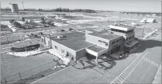  ??  ?? A large hangar and second-floor offices in the Yarmouth airport terminal building are being leased this spring by the producers of the feature movie The Lighthouse.