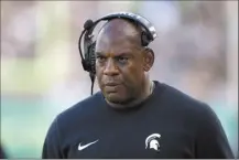  ?? AP file photo ?? By being fired for cause, former Michigan State football coach Mel Tucker stands to lose about $80 million he was due to make through Jan. 15, 2032.