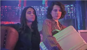 ?? PROVIDED BY WILSON WEBB/WORKING TITLE/FOCUS FEATURES ?? Geraldine Viswanatha­n, left, and Margaret Qualley play friends on a road trip who wind up with a wanted briefcase in the crime comedy “Drive-Away Dolls.”