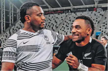  ?? Photo: FRU Media ?? Fiji Airways Flying Fijians fullback Kini Murimuriva­lu (left) and All Blacks winger, Sevu Reece share a light moment after their Test match on July 10, 2021 at Forsyth Barr Stadium, Dunedin.