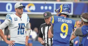  ?? ROBERT HANASHIRO/USA TODAY SPORTS ?? Jared Goff, left, and Matthew Stafford at a coin flip before the start of a game at SoFi Stadium on Oct. 24, 2021, in Inglewood, Calif.