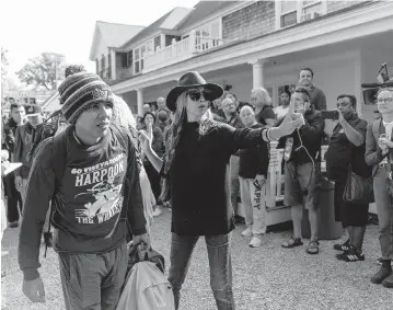  ?? MATIAS J. OCNER mocner@miamiheral­d.com ?? A Venezuelan migrant heads to a bus on Friday on Martha’s Vineyard. Florida Gov. Ron DeSantis’ decision to fly migrants there could affect elections in South Florida and statewide.