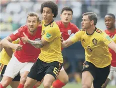  ??  ?? Harry Kane (left) battles against Belgium’s Axel Witsel on Saturday.