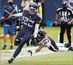  ?? WADE PAYNE — THE ASSOCIATED PRESS ?? Derrick Henry, left, who led the NFL in rushing yards (1,540) and touchdowns (16) last season, has run for 588yards and six TDS for the 5-0Titans in 2020.