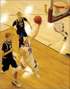  ?? MARK HUMPHREY ENTERPRISE-LEADER ?? Lincoln senior Dalton Lee, shown competing against Shiloh Christian, puts up a shot underneath the goal. The Wolves lost at Shiloh Christian, 72-42, Jan. 24, then rebounded with a 48-45 victory at Haas Hall on Thursday.