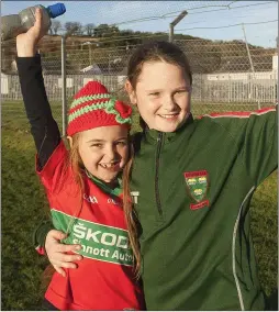  ??  ?? Happy fans Jade Merrigan and Clara Earls at the final whistle.