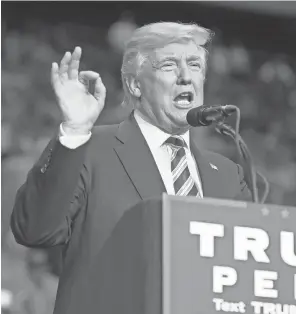  ?? GREGG PACHKOWSKI, PENSACOLA ( FLA.) NEWS JOURNAL ?? Donald Trump speaks during a rally at the Pensacola ( Fla.) Bay Center on Friday.
