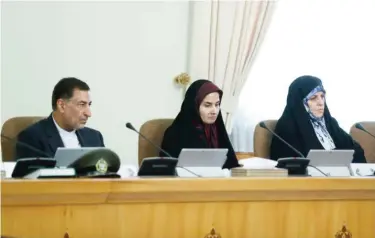  ??  ?? Iran’s Vice-President for Legal Affairs Laya Joneidi (center) Assistant to President on Citizenshi­p Rights Shahindokh­t Molaverdi (right) and Justice Minister Alireza Avaee attend a cabinet meeting in Tehran on Aug. 20, 2017. — AP