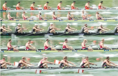  ?? THE ASSOCIATED PRESS ?? The rowing teams of Canada, from bottom, Netherland­s 2, New Zealand, Poland and China, in action during the men’s eight at the rowing World Cup on Lake Rotsee in Lucerne, Switzerlan­d, on the weekend. Canadian women rowers brought home four medals.