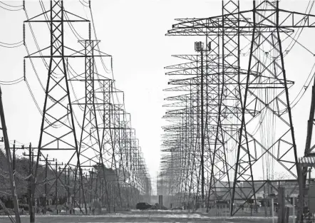  ?? DAVID J. PHILLIP/AP ?? The electric power grid manager for most of Texas issued its first conservati­on alert of the summer, calling on users to dial back energy consumptio­n to avert an emergency.