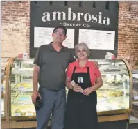  ?? The Sentinel-Record/Mara Kuhn ?? AMBROSIA: Mick Stoyanov, left, and Millie Baron, owners at Ambrosia Bakery Co., are shown at the bakery’s new downtown location at 307 Broadway St.