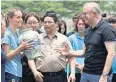  ?? AFP ?? Pham Minh Chinh, centre, and Anthony Albanese, right, in Hanoi yesterday.