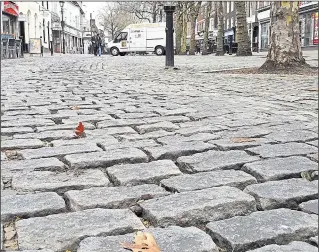  ??  ?? The cobbles in Ashford’s Lower High Street have sparked concern