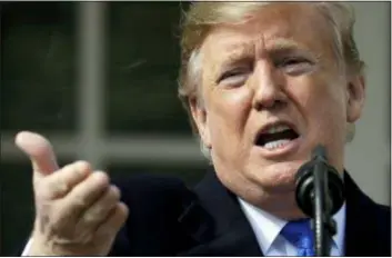  ?? EVAN VUCCI — THE ASSOCIATED PRESS ?? President Donald Trump speaks during an event in the Rose Garden at the White House to declare a national emergency in order to build a wall along the southern border, Friday in Washington.