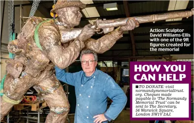  ??  ?? Action: Sculptor David Williams-Ellis with one of the 9ft figures created for the memorial