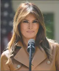  ?? The Associated Press ?? IN GOOD HEALTH: First lady Melania Trump speaks on her initiative­s during an event in the Rose Garden of the White House on May 7 in Washington. Melania Trump is trying to tamp down speculatio­n about why she has not been seen in public in nearly three...