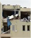  ?? Pankaj Sharma/Gulf News Archives ?? The damaged fifth-floor apartment in Al Khail Gate after the blast.