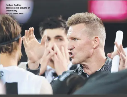  ?? Picture: SARAH REED ?? Nathan Buckley addresses his players on Wednesday.