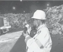  ?? COURANTFIL­E PHOTO ?? Mary Ann Bergenty, field manager of enforcemen­t for MIRA, gives a thumbs-up to a heavy-equipment operator in one of the trash-to-energy plant’s bays in 2018.