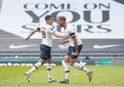  ?? AFP ?? Tottenham’s Toby Alderweire­ld, right, celebrates his goal against Arsenal.