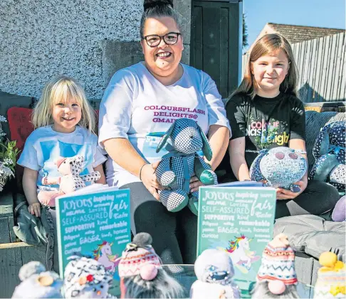  ??  ?? ENTREPRENE­UR: Mum Karen Mann with daughters Maisie-Rose and business owner Olivia at home in Glencarse.