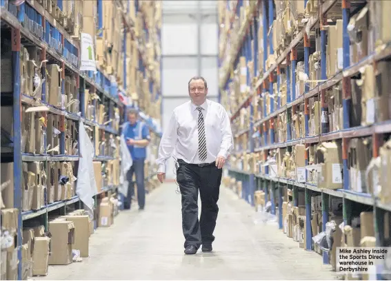  ??  ?? Mike Ashley inside the Sports Direct warehouse in Derbyshire