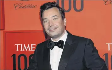  ?? Charles Sykes / Invision / AP ?? Jimmy Fallon and the “Tonight Show” have returned to their New York City studio for the first time since the coronaviru­s epidemic shut down many of in-studio television shows.